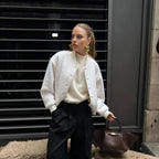 Blouson aviateur d'automne avec poche, manteau en laine d'agneau blanche pour femme, style décontracté et chic, idéal pour le bureau, collection 2025.