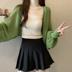 Summer thin loose solid color knitted sweater women's new short style sun protection hollow out cover sweater shawl top