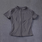 Veste de sport décontractée et ajustée pour femme, manches courtes, fermeture éclair, haut uni, tenue de cyclisme, course à pied et yoga, vêtements d'été