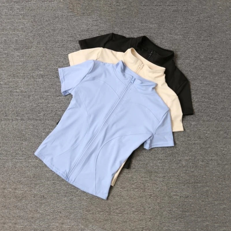 Veste de sport décontractée et ajustée pour femme, manches courtes, fermeture éclair, haut uni, tenue de cyclisme, course à pied et yoga, vêtements d'été