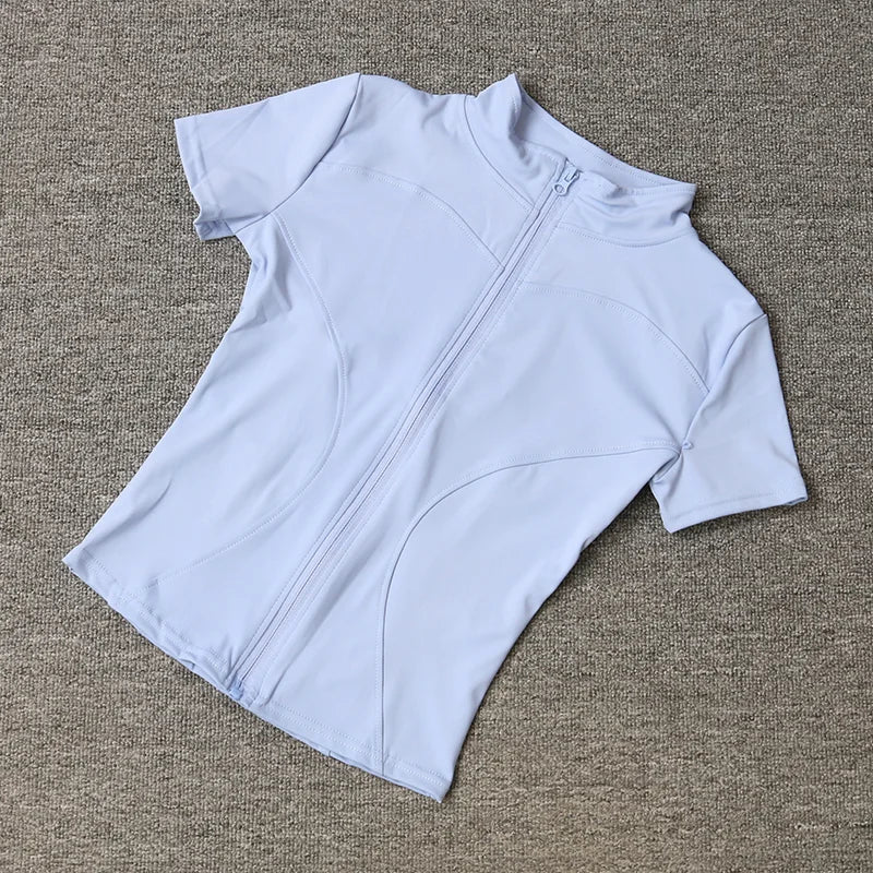 Veste de sport décontractée et ajustée pour femme, manches courtes, fermeture éclair, haut uni, tenue de cyclisme, course à pied et yoga, vêtements d'été