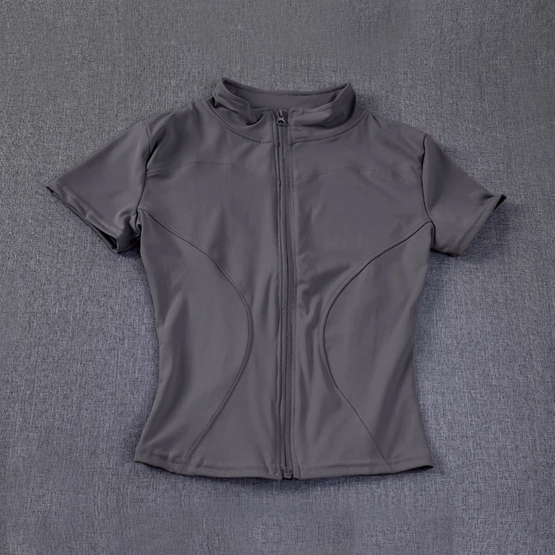 Veste de sport décontractée et ajustée pour femme, manches courtes, fermeture éclair, haut uni, tenue de cyclisme, course à pied et yoga, vêtements d'été