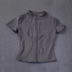 Veste de sport décontractée et ajustée pour femme, manches courtes, fermeture éclair, haut uni, tenue de cyclisme, course à pied et yoga, vêtements d'été