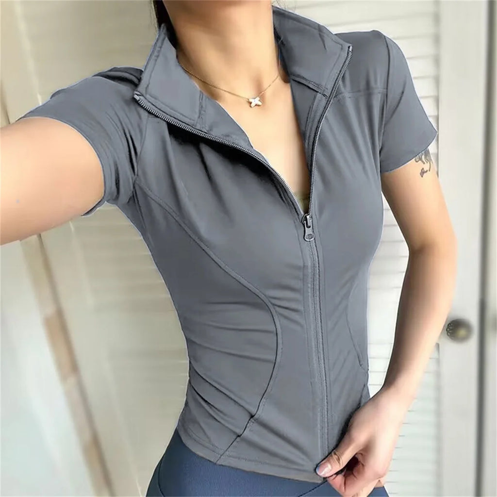 Veste de sport décontractée et ajustée pour femme, manches courtes, fermeture éclair, haut uni, tenue de cyclisme, course à pied et yoga, vêtements d'été