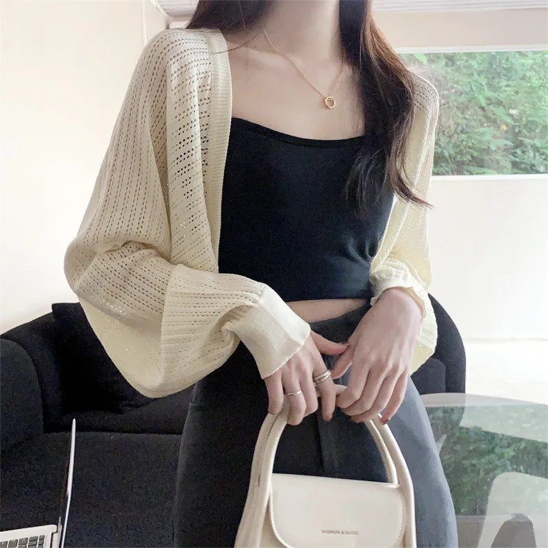 Summer thin loose solid color knitted sweater women's new short style sun protection hollow out cover sweater shawl top