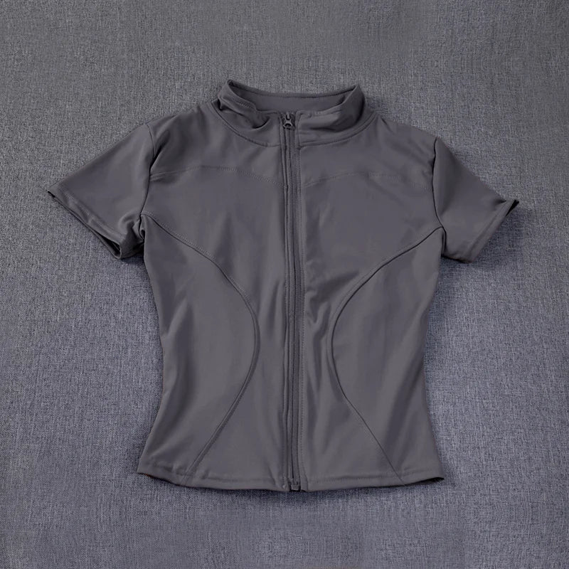 Veste de sport décontractée et ajustée pour femme, manches courtes, fermeture éclair, haut uni, tenue de cyclisme, course à pied et yoga, vêtements d'été